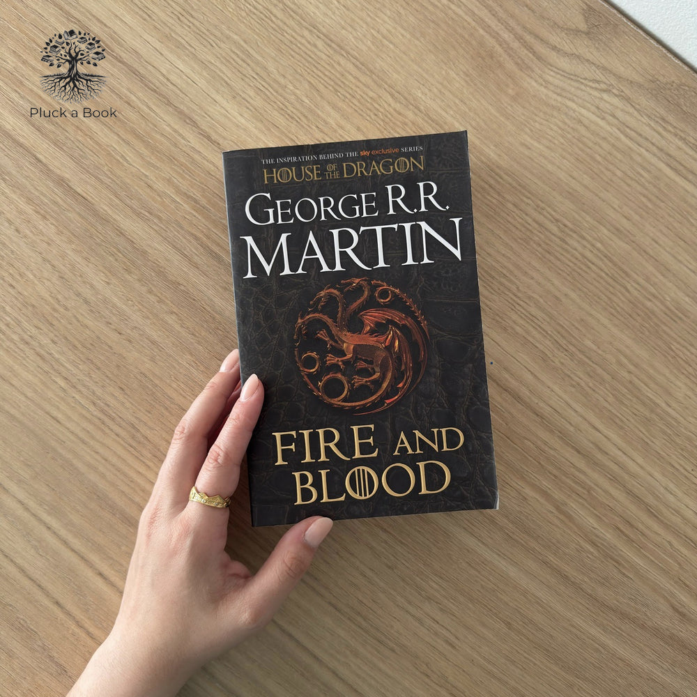 FIRE AND BLOOD: (300 Years Before a Game Of Thrones a Targaryen History) by George R.r. Martin