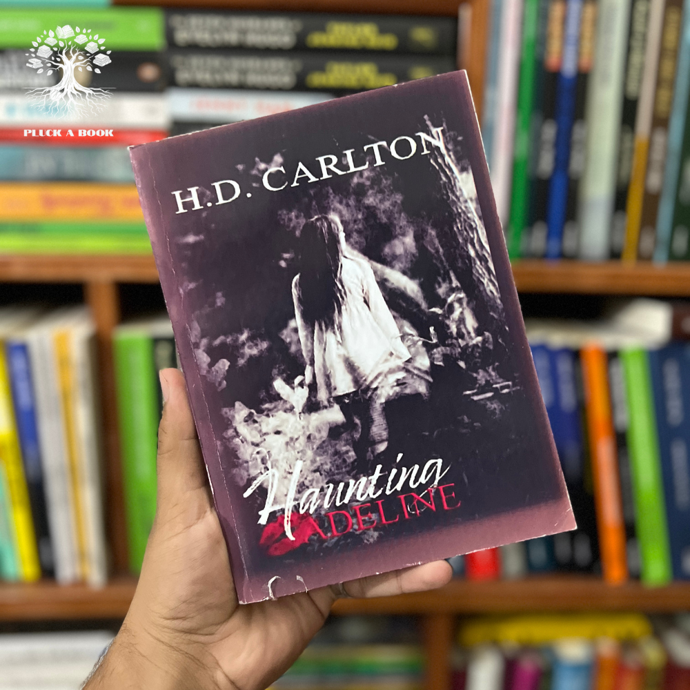 HAUNTING ADELINE by H.D. Carlton