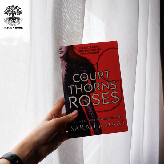A COURT OF THORNS AND ROSES by Sarah J. Maas